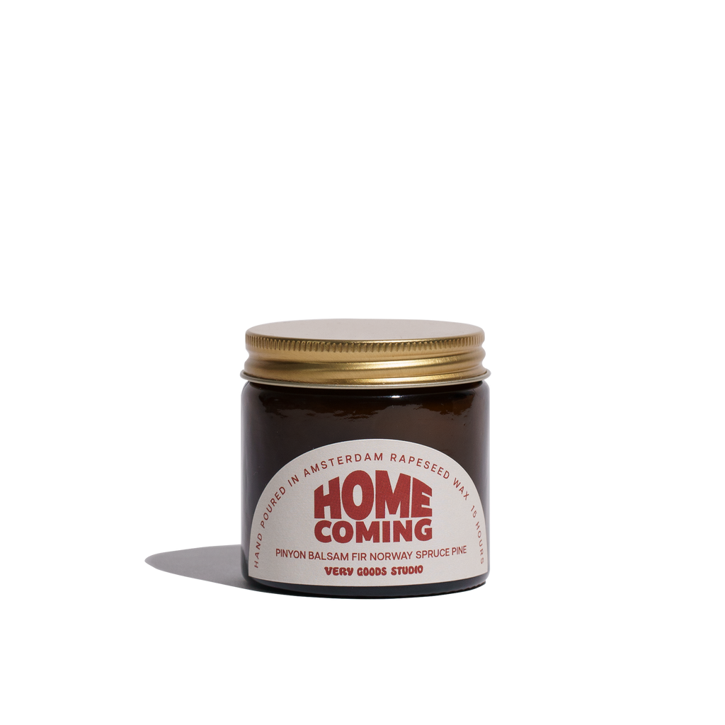 HOME COMING Duftkerze in bernsteinfarbenem Glas, 60 ml, 12–15 Stunden Brenndauer