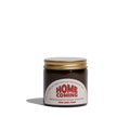 HOME COMING Duftkerze in bernsteinfarbenem Glas, 60 ml, 12–15 Stunden Brenndauer
