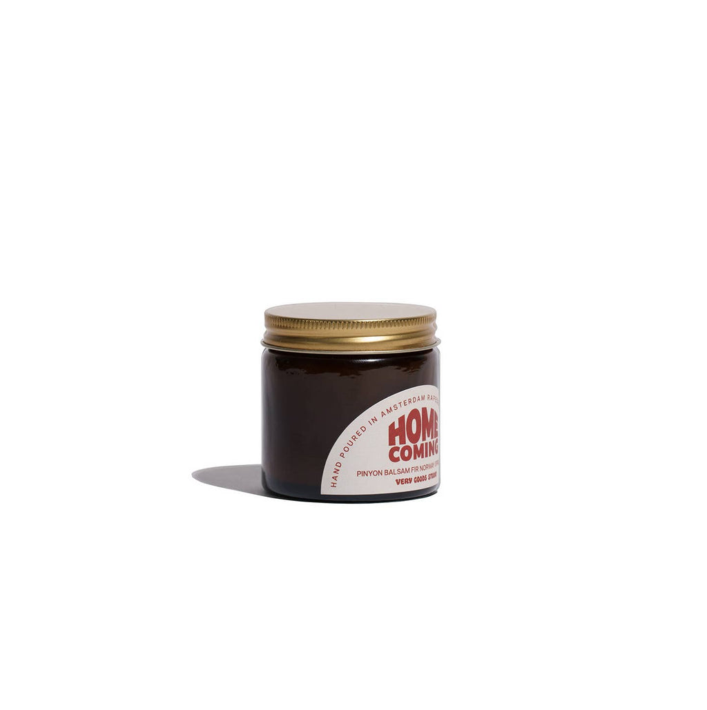 HOME COMING Duftkerze in bernsteinfarbenem Glas, 60 ml, 12–15 Stunden Brenndauer