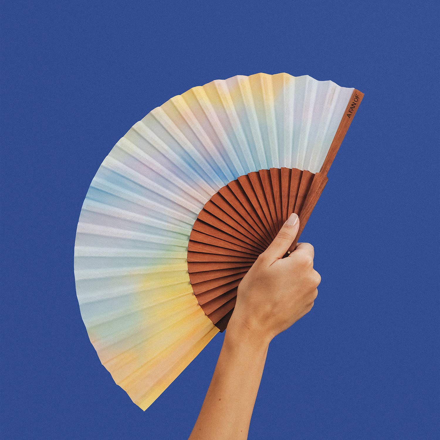 Fächer AURORA SKIES - 23 cm - Blau, Gelb, Rosa