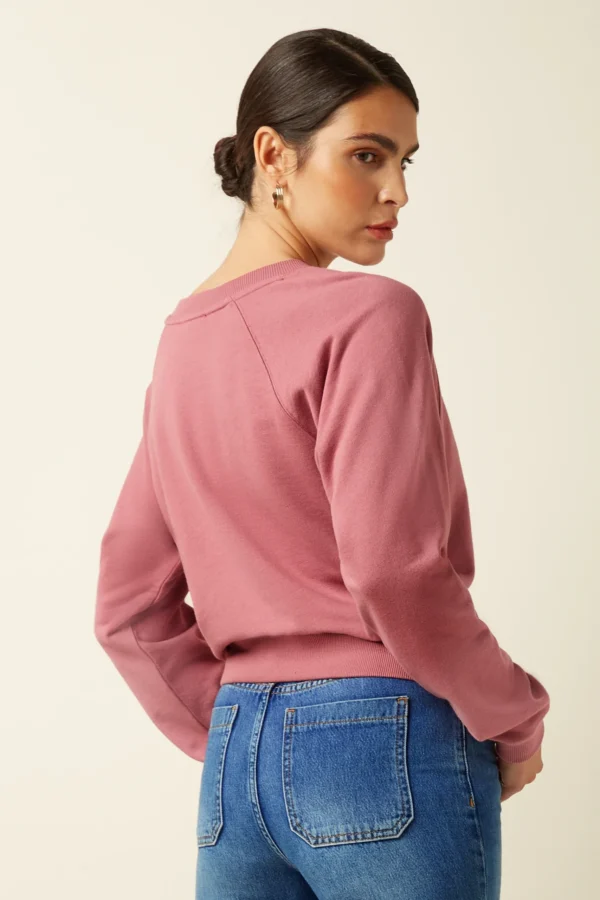 Kinglouie-Febe Sweater Peachy Farbe Mesa Pink - Peachy Der Febe Pullover Peachy ist aus weichem Baumwolljersey mit Stretch gefertigt – für Komfort. Mit Rundhalsausschnitt, Raglanärmeln und gerippten Abschlüssen für eine schmeichelnde Passform. Der King Louie Print setzt einen stylischen Akzent – perfekt für mühelosen Alltagslook. Sweater mit King Louie Druck Rundhalsausschnitt Raglan-Ärmel Ribbed edge finish Baumwolle Jersey Stretch Material: 50% organic cotton, 50% modal
