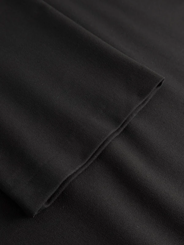 60s Kleid mit Knöpfen aus Webstoff Kompakter Webstoff Taillierte Silhouette Leicht ausgestellter Saum Mini-Länge Hemdkragen Kurze Knopfleiste mit Statement Knöpfe Echte Klassiker kommen nie aus der Mode! Das Sixties / Mod Kleid: laut, kurz, ikonisch – und garantiert Komplimente im Minutentakt. Wir haben diesem Lieblings Teil weite Ärmel verpasst – für ein bisschen mehr Modernism.